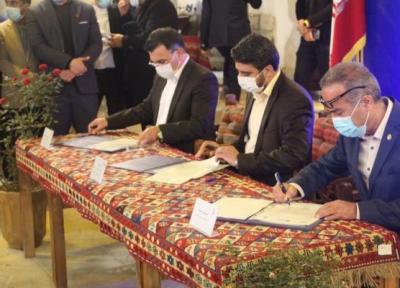 خبرنگاران تفاهم نامه بازسازی و احیاء عمارت حاج رئیس بوشهر به امضا رسید